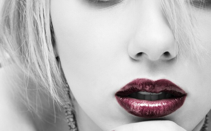 close-up of lips with red lipstick