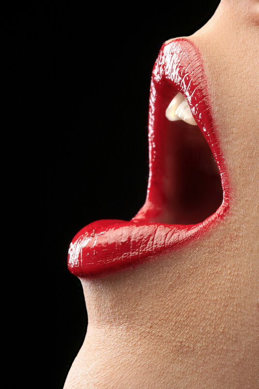 close-up of lips with red lipstick