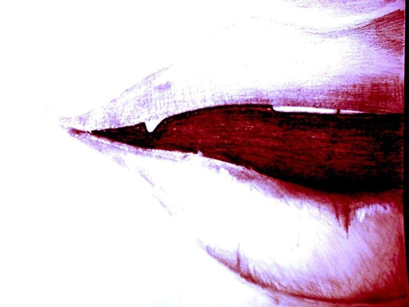close-up of lips with red tint
