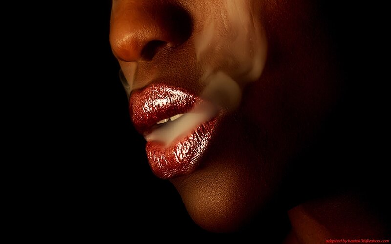 close-up of lips with smoke