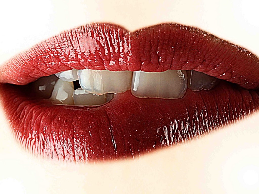 close-up of lips with teeth