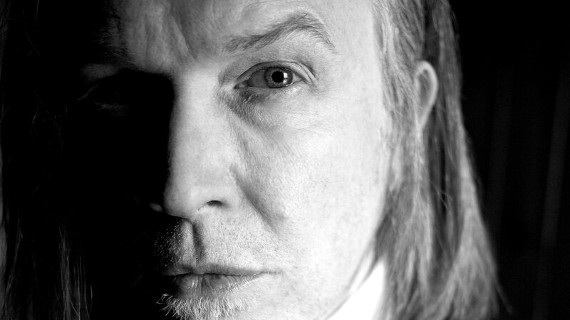 Close-up of Man's Face — Black, Dramatic, Photograph, Long Hair