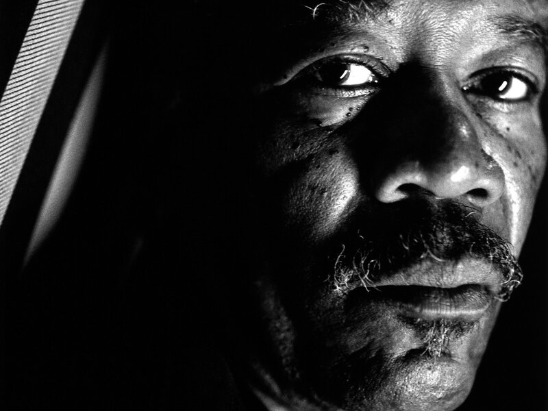 Close-up of Man's Face — Black, Dramatic, Photograph, Mustache, Eyes