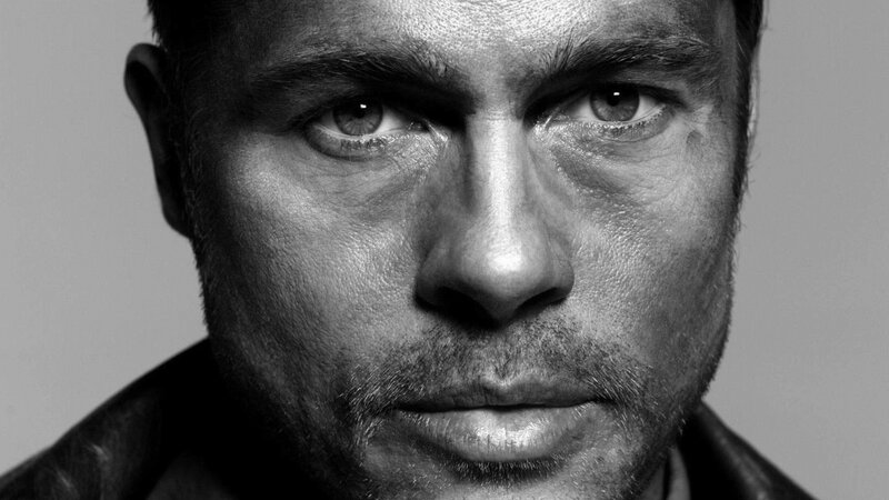 Close-up of Man's Face — Black, Serious, Photograph, Eyes, Jacket