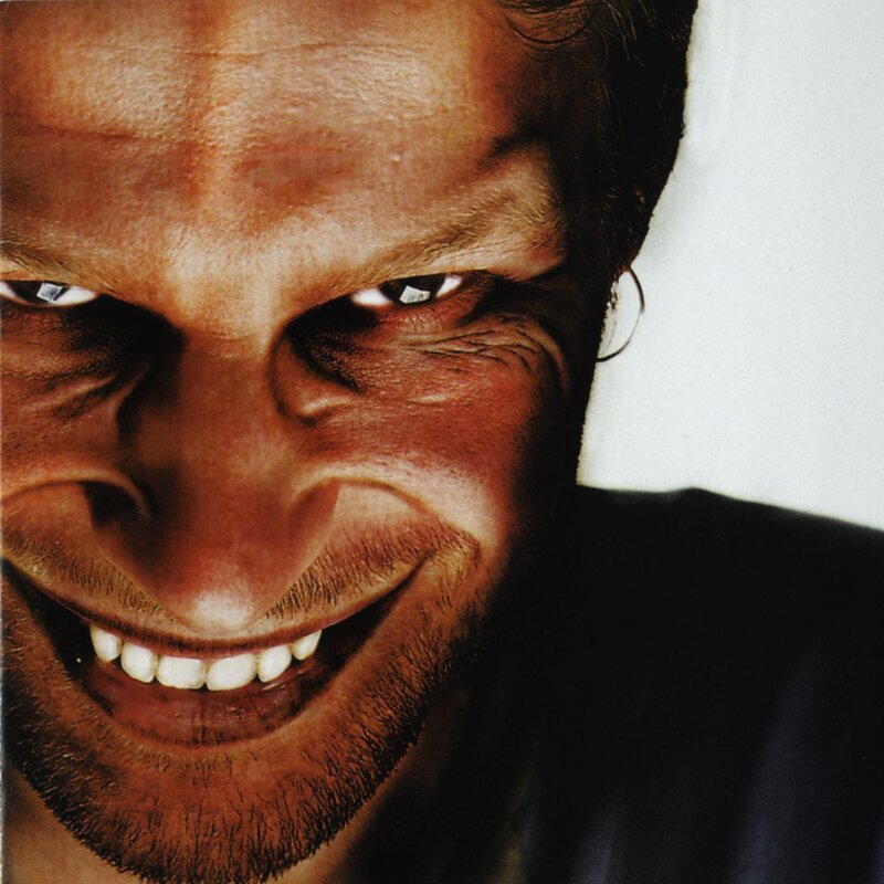 Close-up of Man's Face — Brown, Intense, Photograph, Smile