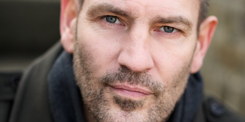 Close-up of Man's Face — Gray, Serious, Photograph