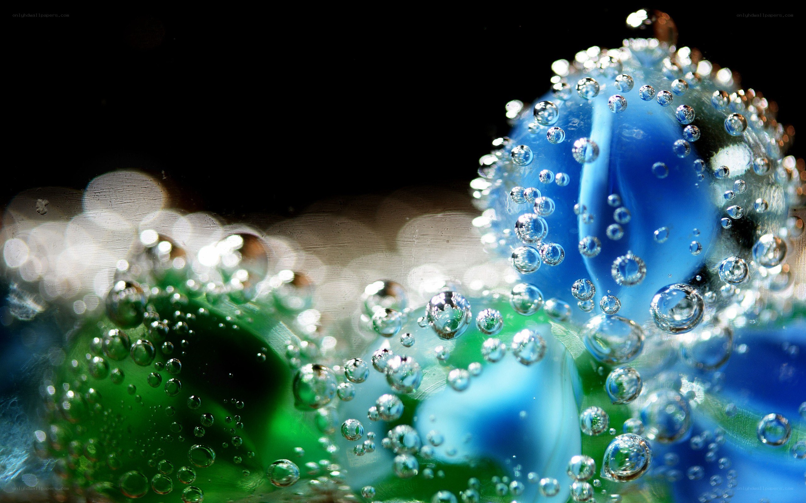 Close-up of marbles with bubbles