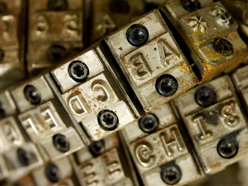 close-up of metal letterpress blocks