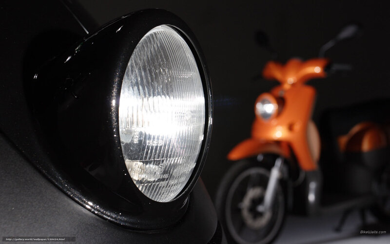 Close-up of motorcycle headlight