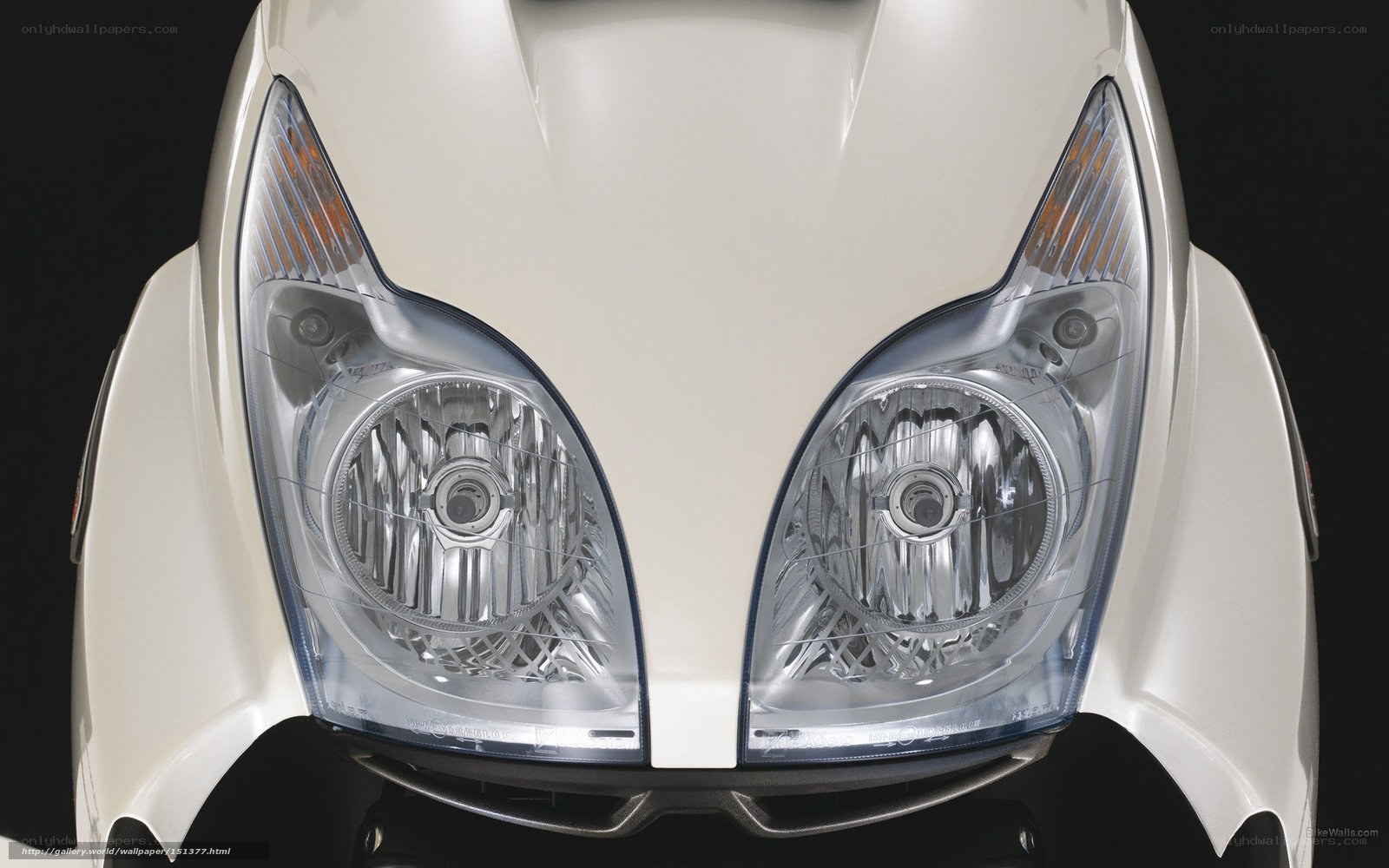 close-up of motorcycle headlights