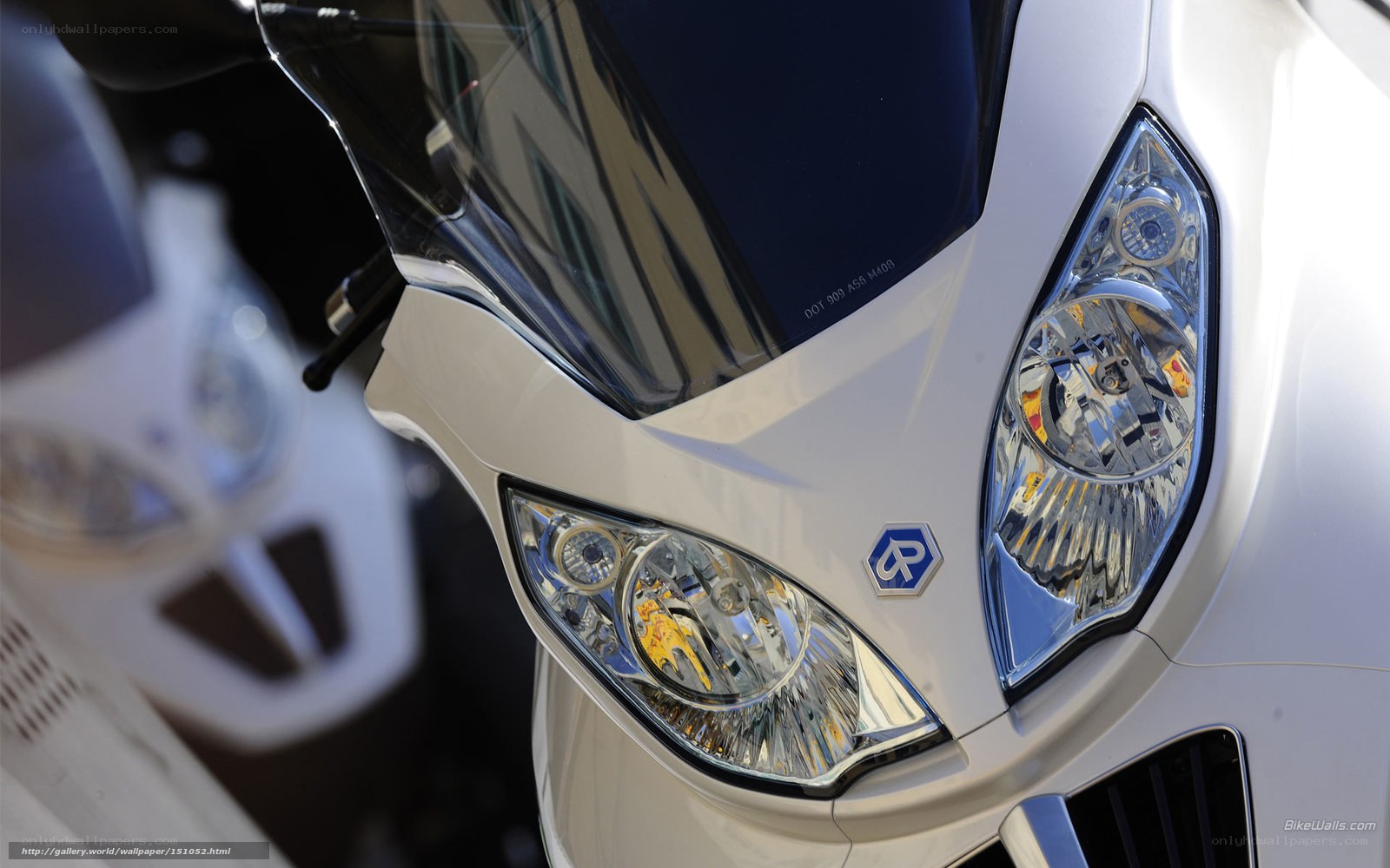 Close-up of motorcycle headlights