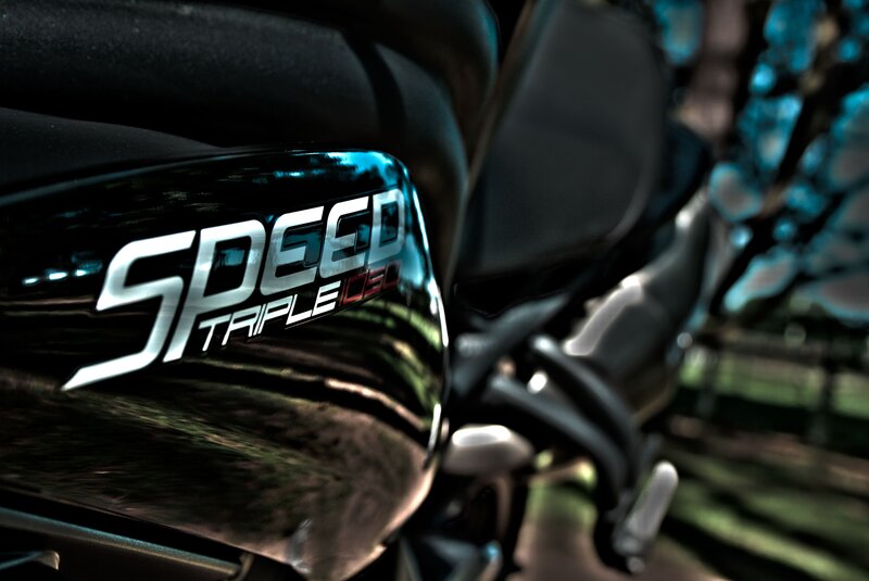 Close-up of motorcycle speed badge