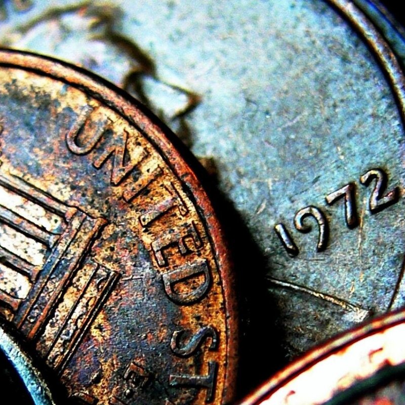 Close-up of old coins