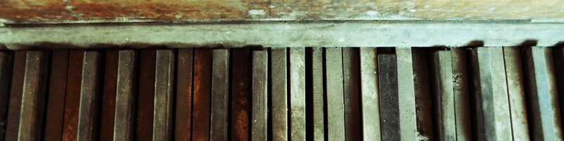close-up of old piano keys