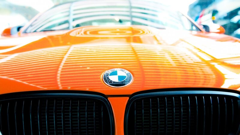Close-up of orange BMW car