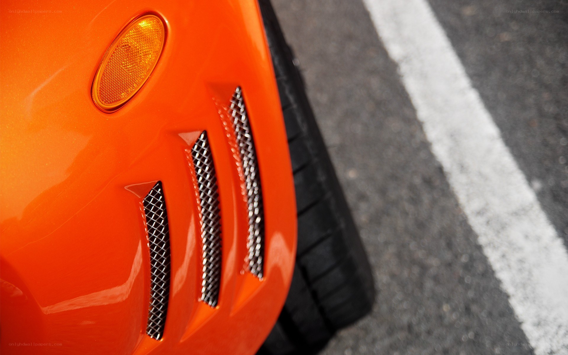 Close-up of orange car vent