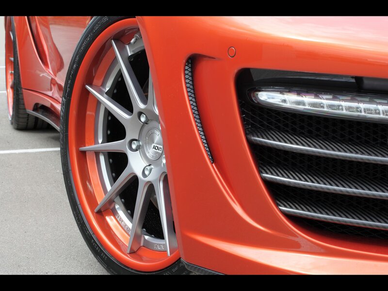 close-up of orange car wheel