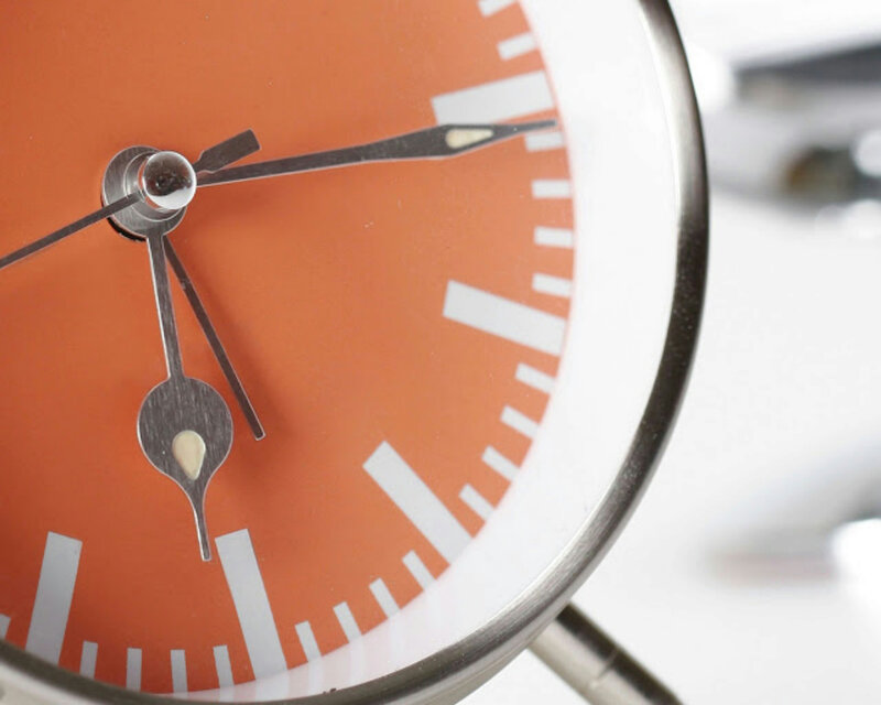 Close-up of Orange Clock