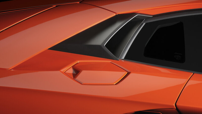 Close-up of orange sports car