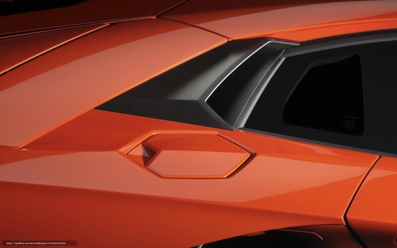 Close-up of orange sports car