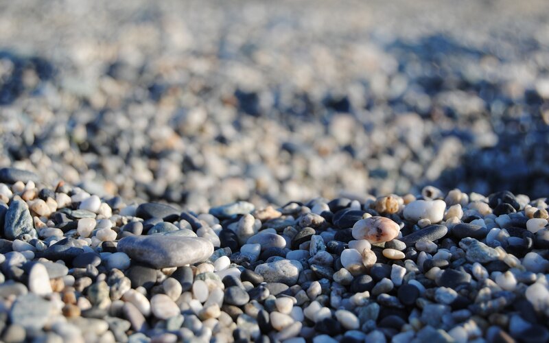 Close-up of pebbles on a beach