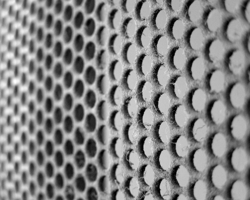 close-up of perforated metal mesh