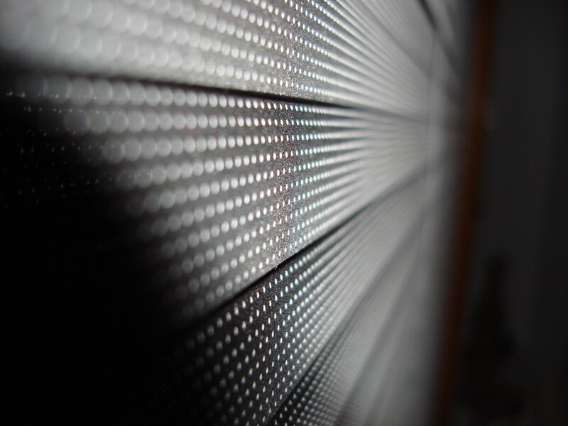 close-up of perforated metal surface
