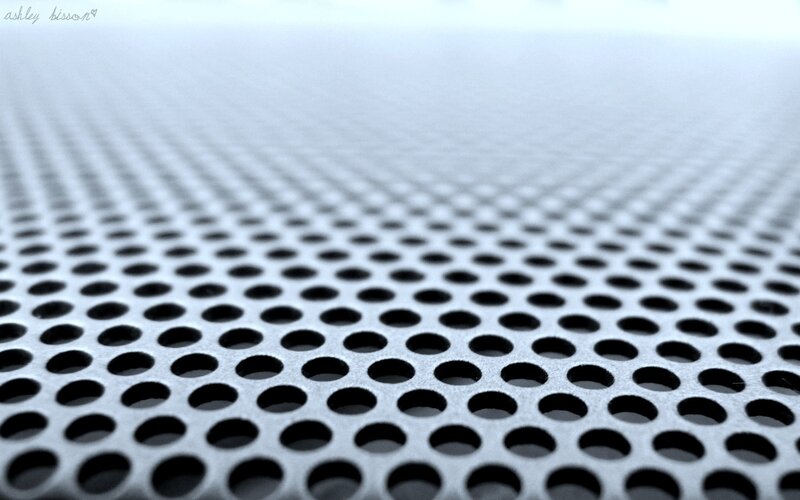 close-up of perforated metal surface