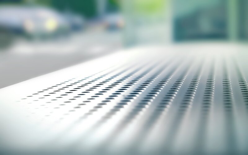 close-up of perforated metal surface