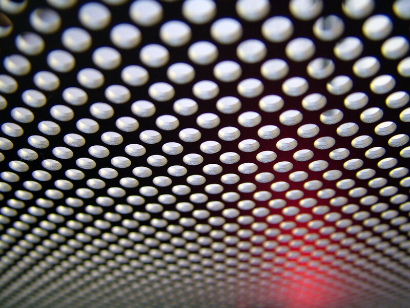 close-up of perforated metal surface