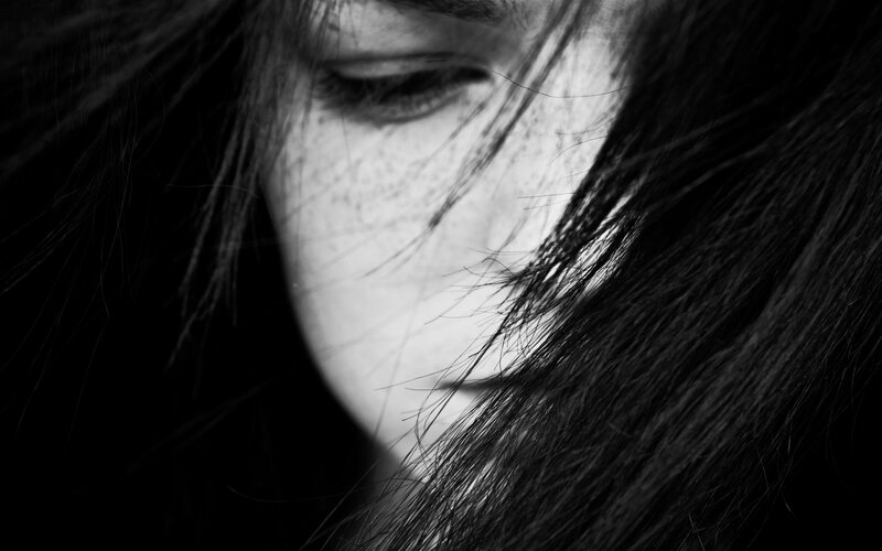 Close-up of Person's Face — Black, Dramatic