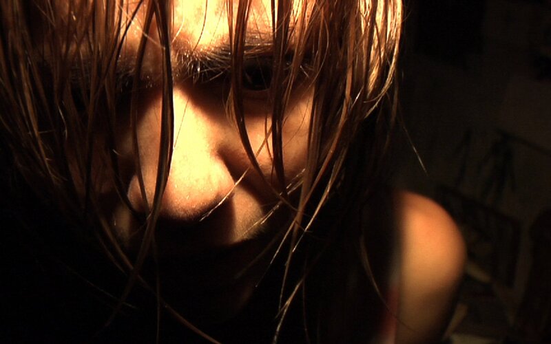 close-up of person with wet hair