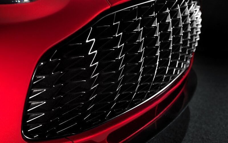 close-up of red car grille