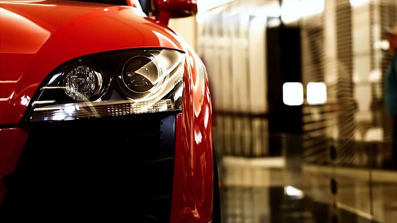 Close-up of red car headlight