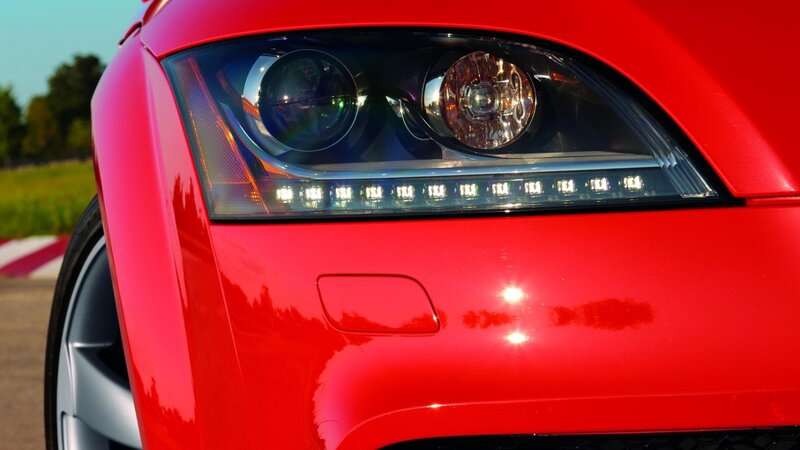close-up of red car headlight