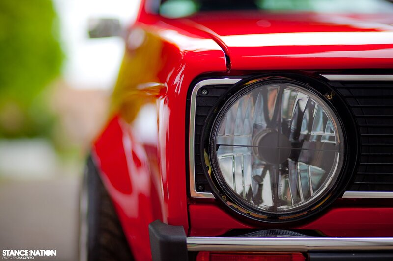 close-up of red car headlight