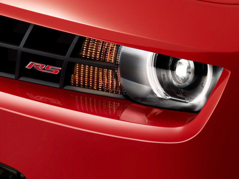 Close-up of red car headlight