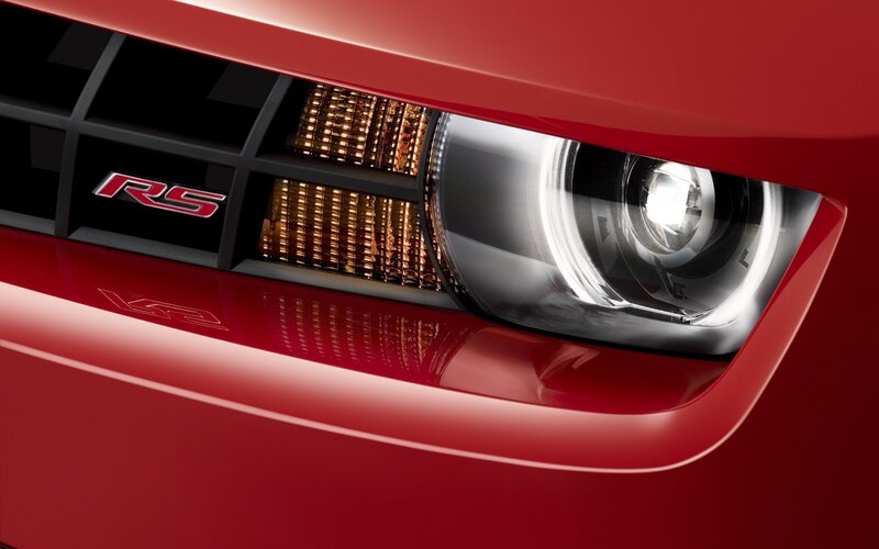 Close-up of red car headlight