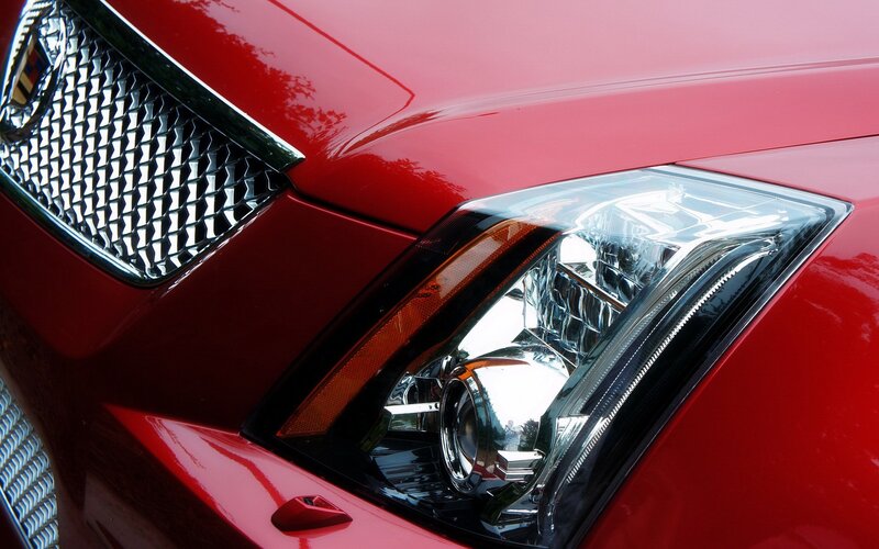 close-up of red car headlight