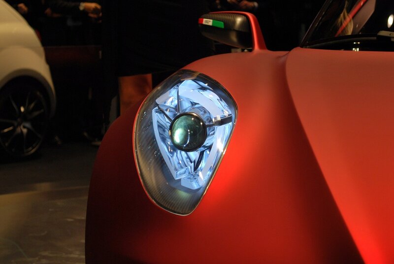 Close-up of red car headlight