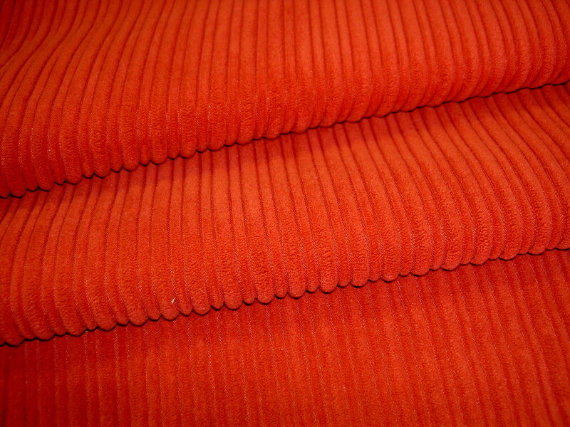 Close-up of red corduroy fabric