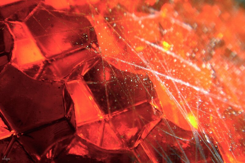 Close-up of red cracked glass