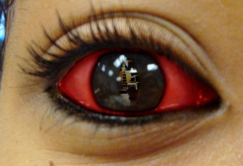 Close-up of Red Eye — Dramatic, Photograph, Reflection