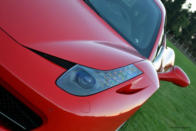 Close-up of red Ferrari front