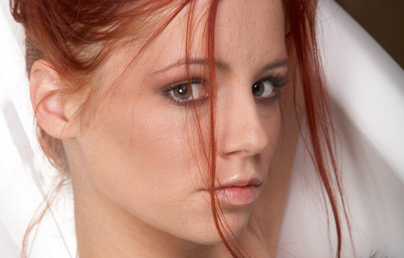 close-up of red-haired woman
