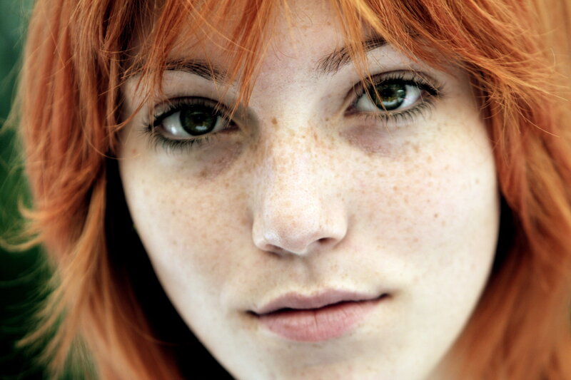 close-up of red-haired woman