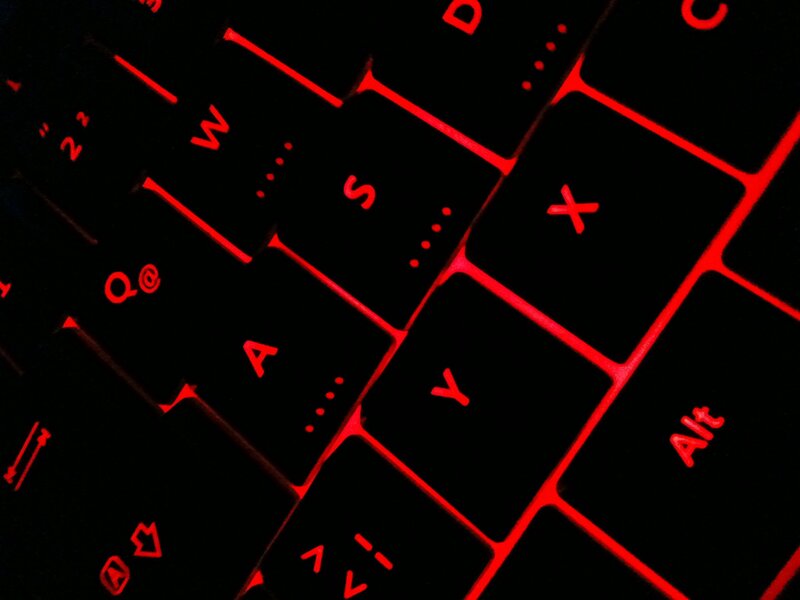 close-up of red-lit keyboard