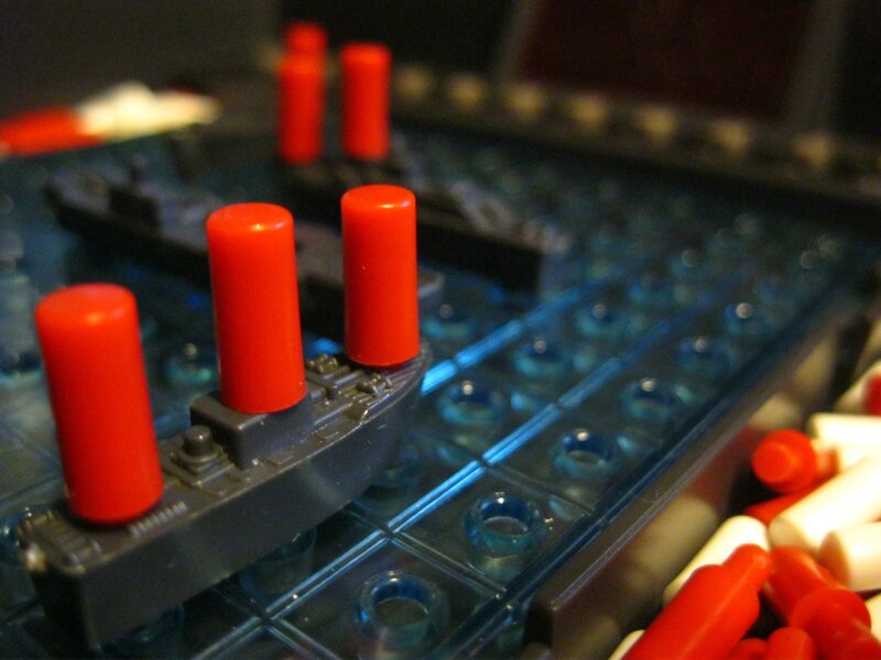 close-up of red pegs on a game board