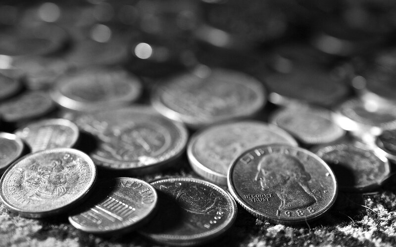 Close-up of scattered coins