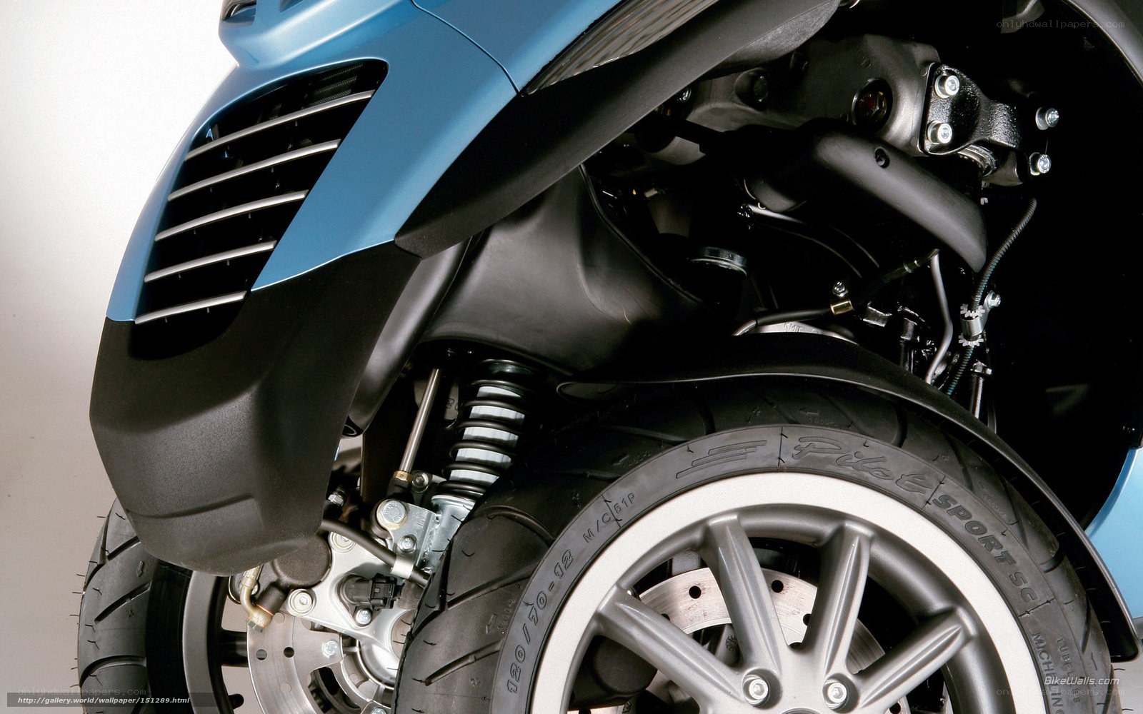 close-up of scooter front wheel